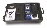 A case with a cell phone and other items inside of it.